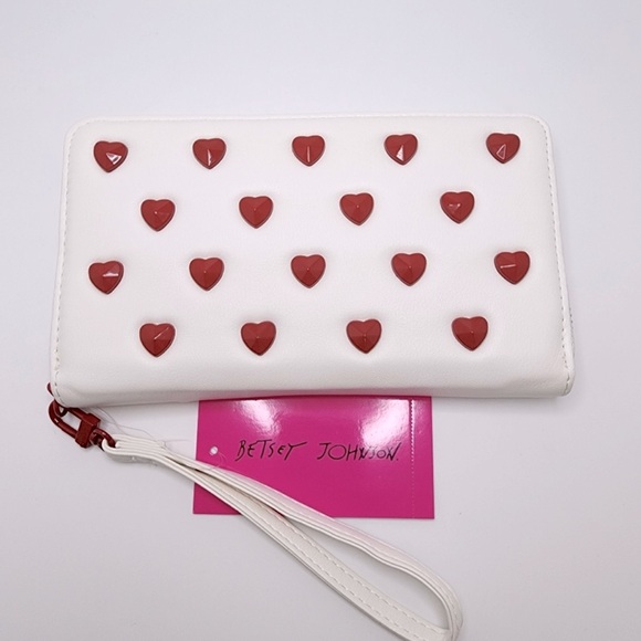 Betsey Johnson Handbags - NWT Betsey Johnson Embossed heart design wristlet with removal wrist strap